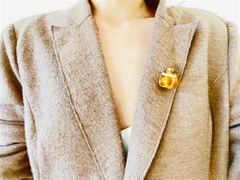 ysl pins|ysl brooch dupe.